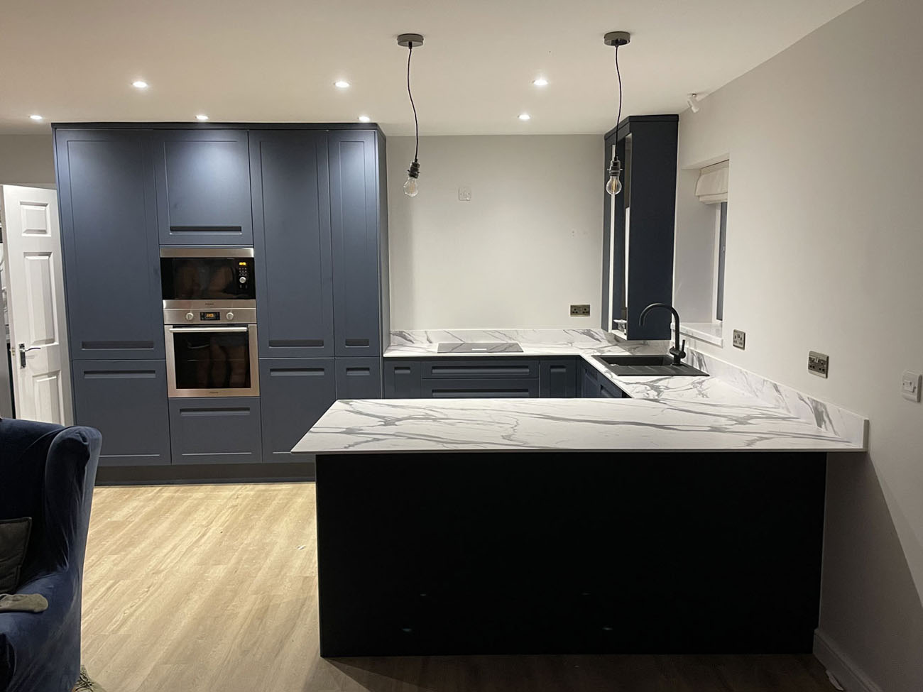 An image of a recently fitted kitchen with new worktops.